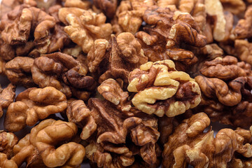 Peeled walnut kernels close-up, focus on foreground