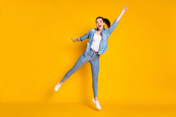 Fototapeta na wymiar Full length body size view of her she attractive lovely glad cheerful cheery funky playful girl jumping holding invisible umbrella forecast isolated bright vivid shine vibrant yellow color background