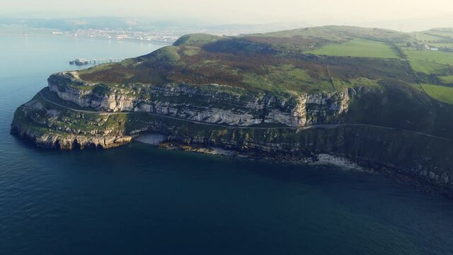 Drone flying over the road on a beautiful rocky mountain, Great Orme