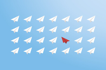 Think differently concept. Red airplane changing direction. New idea, change, trend, courage, creative solution, innovation and unique way concept.