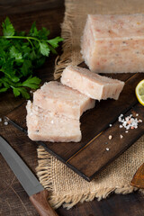Raw minced fish. Minced fish on the kitchen Board on the brown wooden table