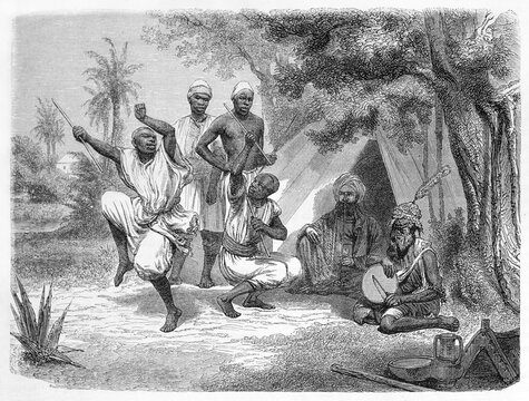 traditional dressed native africans ethnic dance outdoor in a camp in Ezzerib� (?). Ancient grey tone etching style art by Hadamard, Le Tour du Monde, Paris, 1861