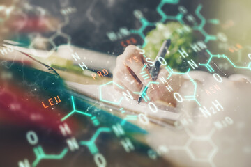 Science formula hologram over woman's hands taking notes background. Concept of study. Double...