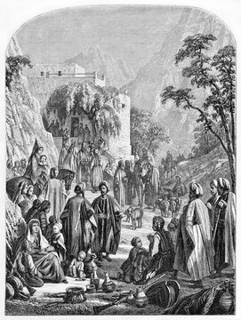 long tunic and turbans dressed Maronites people outdoor in Mar-Antoun convent. Ancient grey tone etching style art by Grandsire, Le Tour du Monde, Paris, 1861