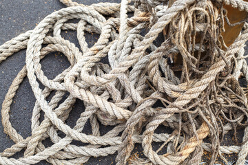 A rope wrapped around a pole. The texture of the rope