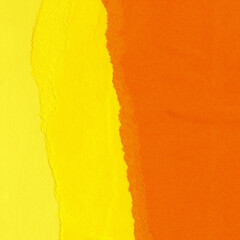 Colorful torn paper collage close-up. Texture made from various paper and cardboard parts. Damaged old paper background. Vintage blank wallpaper. Material design backdrop.