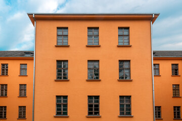Fototapeta na wymiar Facade of orange industrial building