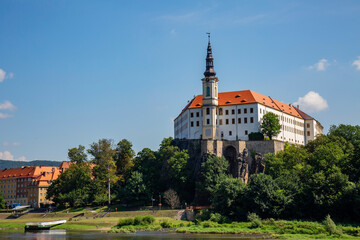 Fototapeta na wymiar Decin castle with dramatic sky, Czech republic