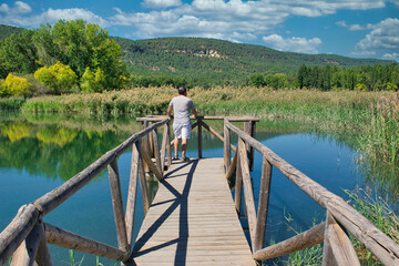 Wooden walkway over the Unya lagoon, Cuenca