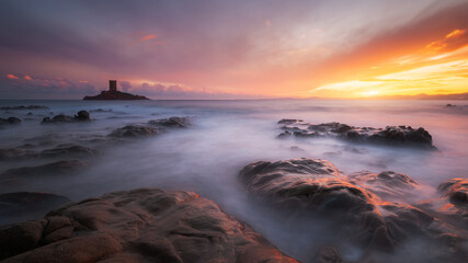 Epic sunset above the golden island and Le Dramont