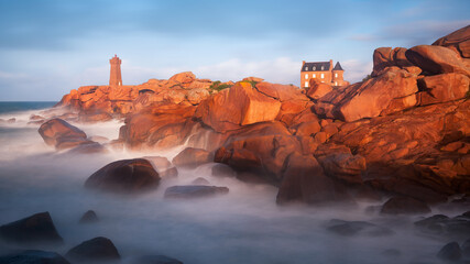 Sunset over the Mean Ruz lighthouse in French Brittany