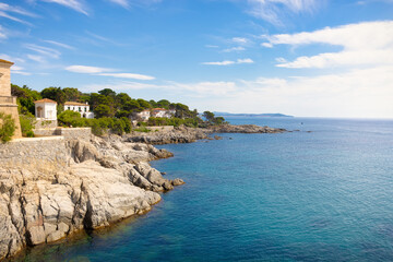 Fototapeta premium Panoramic view of the coast where the coastal path runs above the cliffs. Sant Feliu de Guixols, Costa Brava, Catalonia, Spain