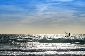 A young woman kitesurfing, province of Cadiz , Spain