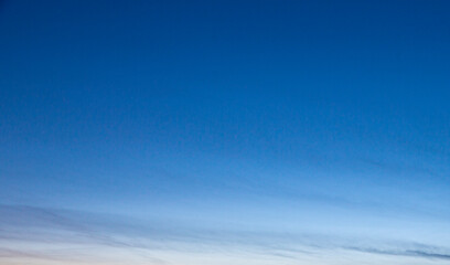 Image of a clear and cloudless sky can be used as background