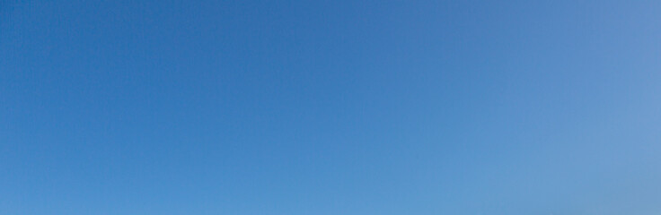 Image of a clear and cloudless sky can be used as background