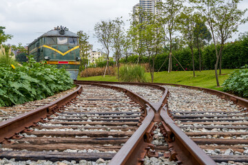 Obraz premium Railroad tracks and locomotives in the wild