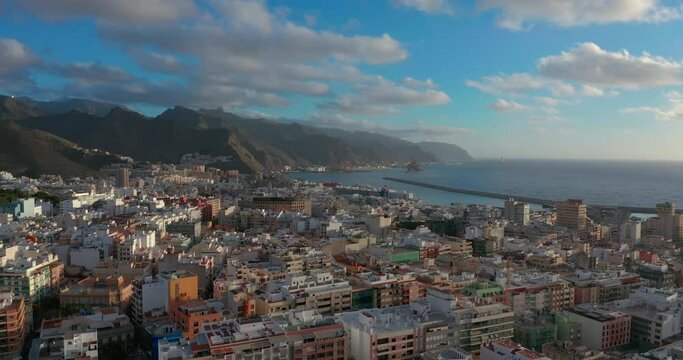 Aerial view. City of Santa Cruz de Tenerife on the sunset. The capital of the Canary Islands in Spain. A city by the ocean.