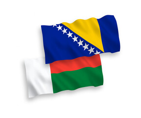 Fototapeta premium Flags of Bosnia and Herzegovina and Madagascar on a white background