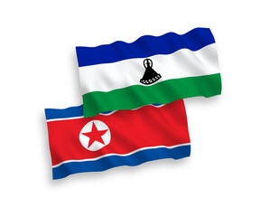 Flags of North Korea and Lesotho on a white background