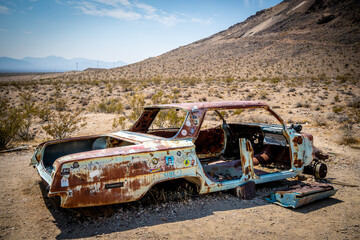 old abandoned car in a desert ghost town