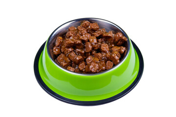 Canned food for cats or dogs in metal green bowl isolated on white background
