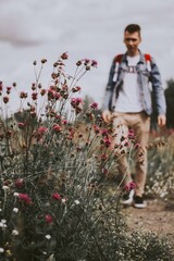 child playing with flowers
