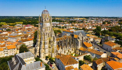 Picturesque summer view of historic areas of Saintes located on Charente river looking out over...