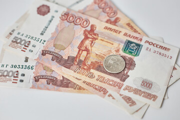 A lot of Russian money banknotes rubles, calculator, receipts, documents, pen background, isolation