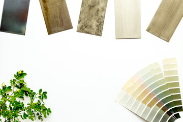 Choosing flooring and furniture materials samples with color scheme. Top view