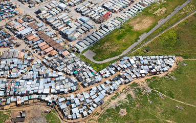 Cape Town, Western Cape / South Africa - 09/28/2020: Aerial photo of shacks in an informal...
