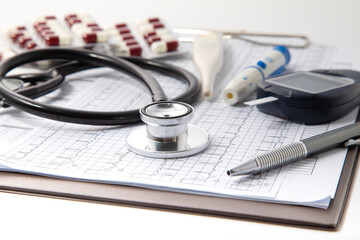 Healthcare insurance and medical background concept. Black stethoscope medical equipments and medical technology concept.