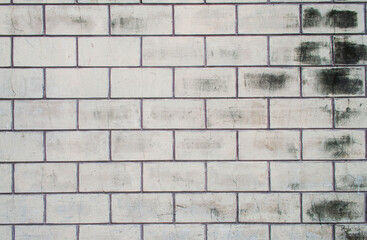White brick wall texture with old vintage stains