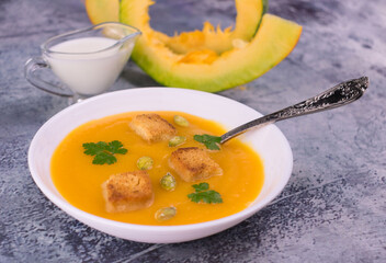 Pumpkin puree soup with cream.
Close-up.