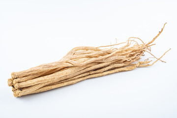 A handful of Chinese herbal medicine Codonopsis on white background