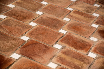 clay pavement with marble squares