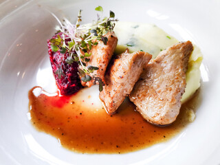 Little portions of Spanish tapas made with pork filet and potatoes.