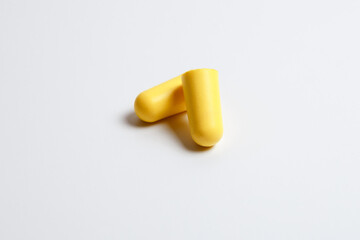 Foam earplugs isolated on white