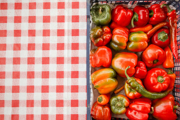 Colorful sweet bell peppers farm harvest, natural background. Flat lay, top view