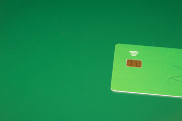 blank card with brown square chip symbol and a WiFi symbol concept of contactless payment as new...