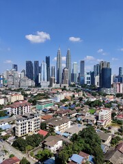 Kuala Lumpur, Malaysia - July 21, 2020: View of Kuala Lumpur skyline during sunny day. noise