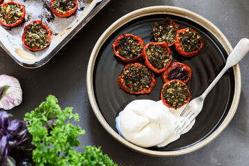 Provencal Tomatoes. Baked Tomatoes with parsley, garlic and olive oil served with burrata cheese