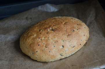 Milk bread on the yeast at home in red form on the board