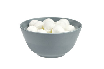 Fototapeta na wymiar Mozzarella cheese balls in a bowl isolated on white background
