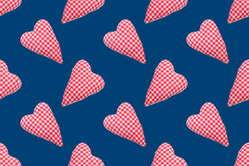 Christmas seamless pattern. Top view soft red heart pads on blue background. Love concept flat lay