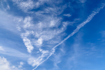 Stunning cirrus cloud formation panorama in a deep blue sky
