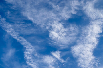 Stunning cirrus cloud formation panorama in a deep blue sky