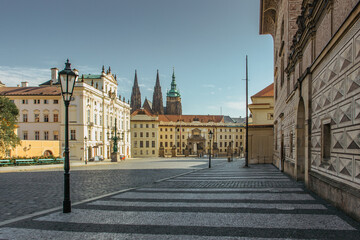 Fototapeta premium Empty street with colorful houses in Prague,Czech capital. No tourists,no sightseeing during COVID 19 quarantine,September 2020.Historical centre without people.Amazing European cityscape.