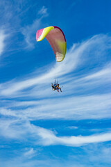 paraglider flight on sun and sea beach