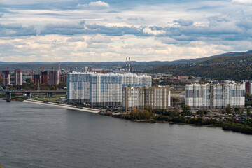 Panoramic view of the city across the river.