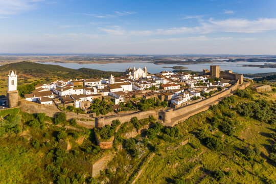 Aerial view of the Monsaraz Castle on a hill overlooking countryside, Portugal.